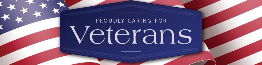 Proudly caring for veterans graphic with American flag background, emphasizing commitment to veteran care in home services.
